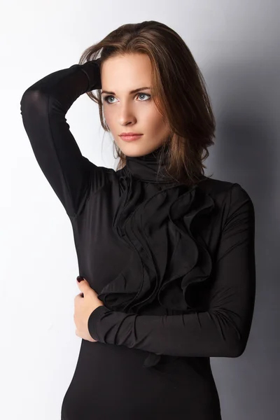 Brunette woman in black — Stock Photo, Image