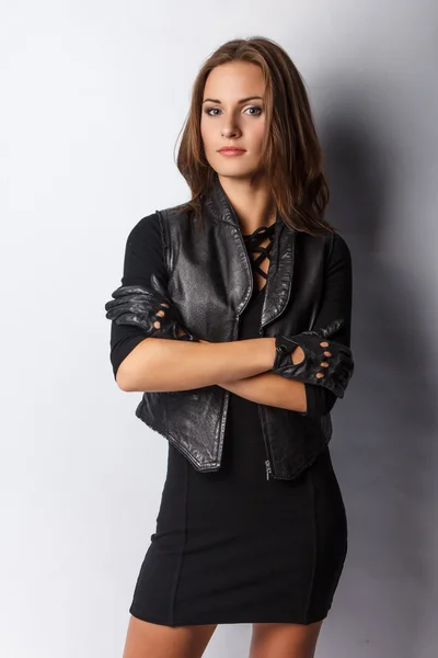 Girl in leather jacket and black gloves. — Stock Photo, Image