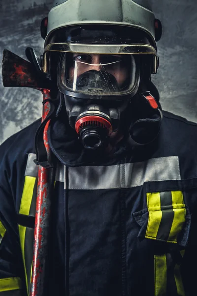 Rescue firefighter in safe helmet — Stock Photo, Image