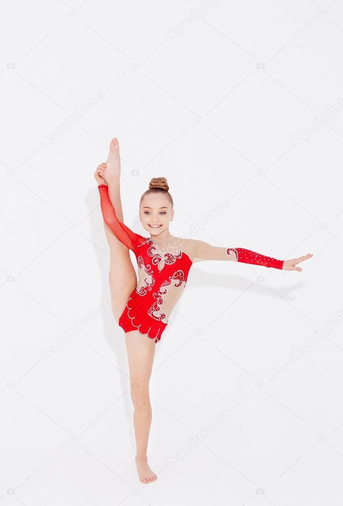 Gymnastic girl in red dress.
