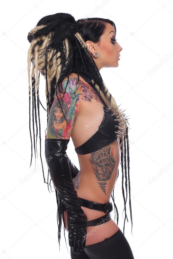 Side view of tattooed emo girl. Stock Photo by ©fxquadro 90893038