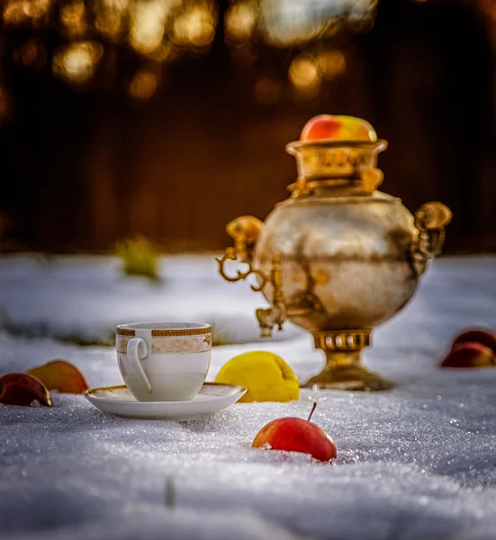 Basket with apples, tea cup — Stock Photo, Image