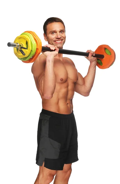 Uomo muscolare che fa esercizi — Foto Stock