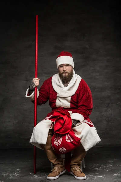 Nach Party-Mann in Weihnachtsmannkleidung. — Stockfoto