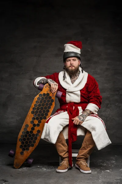 Bearded man in Santa's clothes. — Stock Photo, Image