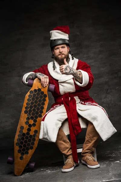 Bearded man in Santa's clothes. — Stock Photo, Image