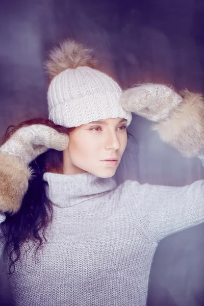 Brunette girl in white sweater. — Stock Photo, Image