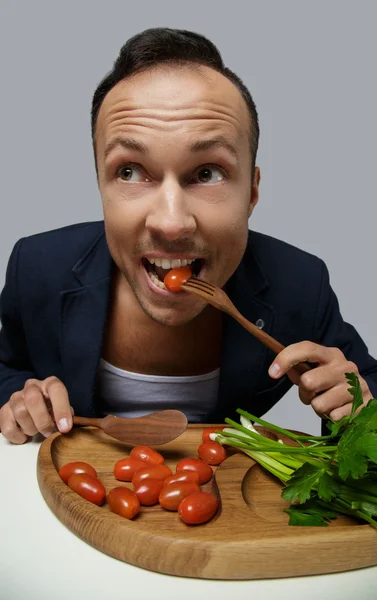 Man eats salad — Stock Photo, Image