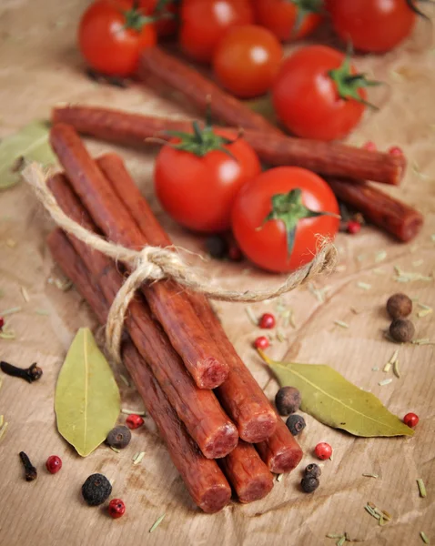 Beef sticks, sausages on a paper background — Stock Photo, Image