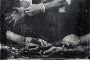 Hands of a maniac wearing rubber gloves. Bones and corpses at the bottom. Textured grunge black and white background clipart