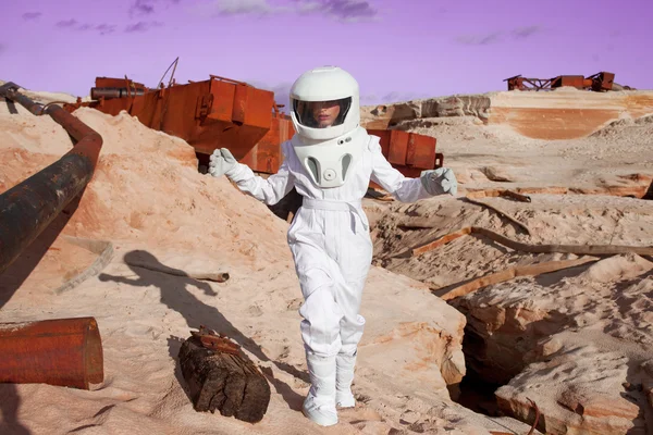 futuristic astronaut on another planet, Mars. image with the effect of toning