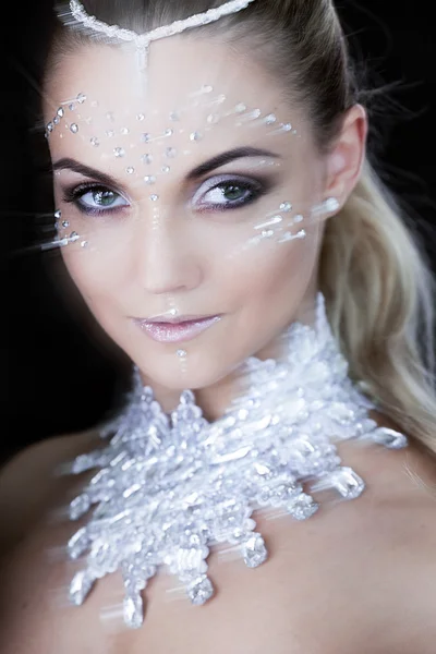 Beauty woman makeup with crystals on face, black background — Stock Photo, Image