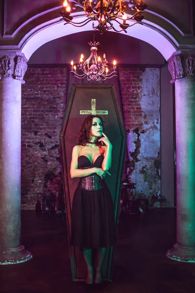 Beautiful and sexy vampire in her mansion. Halloween — Stock Photo, Image