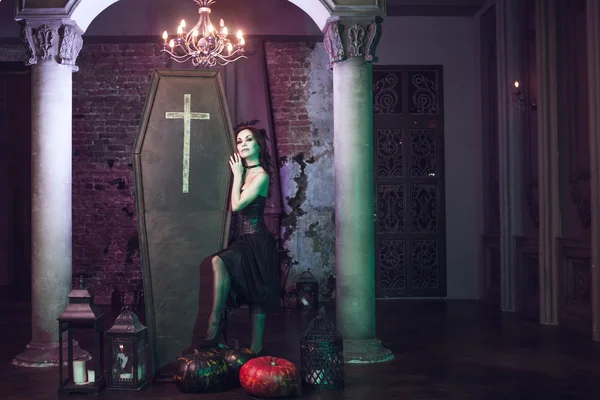 Beautiful and sexy vampire in her mansion. Halloween — Stock Photo, Image