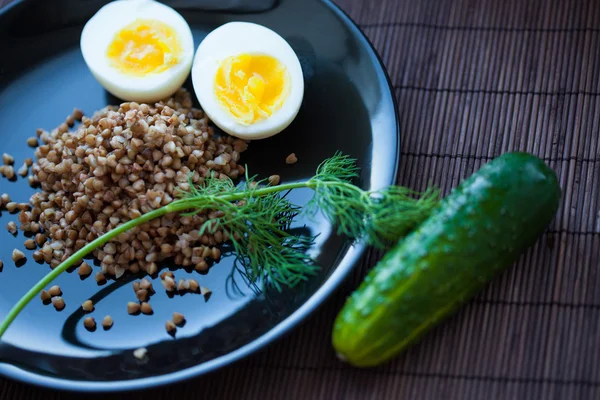 Buckwheat porridge with white fish — Stock Photo, Image