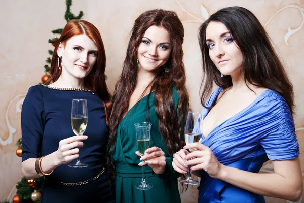 Portrait of cheerful girls at the Cristmas party — Stock Photo, Image