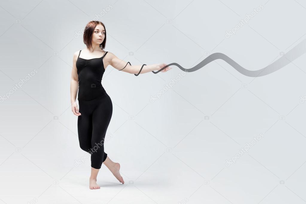 athletic girl posing in Studio with the drawn line, place for your text 
