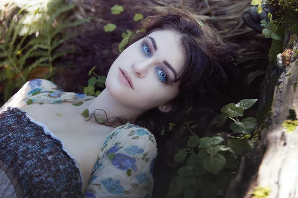 stock image young beautiful girl with blue eyes, magical look into the camera