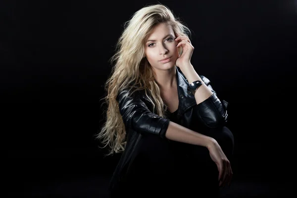 Beautiful and stylish young blonde girl, black background — Stock Photo, Image