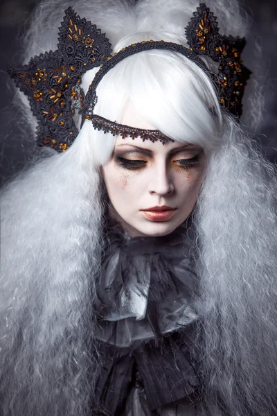 Girl in the image of  witch with a lush white hair — Stock Photo, Image