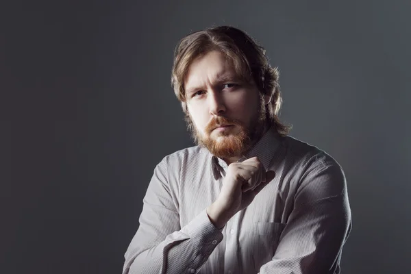 Bearded young man with surprised expression — Stock Photo, Image