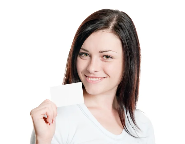 Morena segurando cartão de visita em branco — Fotografia de Stock