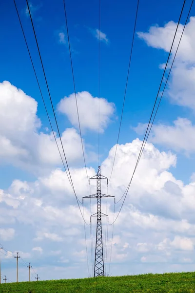 High Voltage Power Lines Receding Distance Background Cloudy Blue Sky — Stockfoto