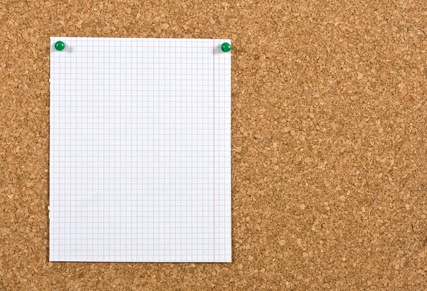 Empty sheet on a corkboard — Stock Photo, Image