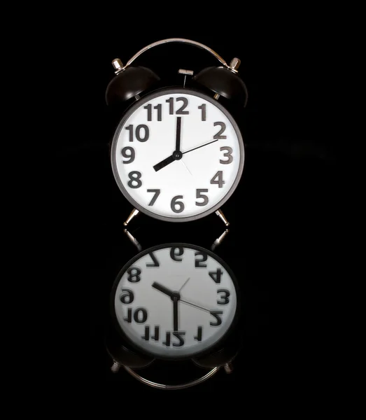 Alarm clock before black — Stock Photo, Image