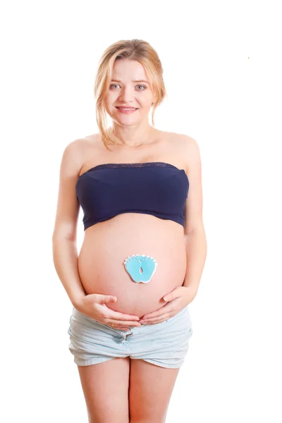 Portret van jonge zwangere vrouw geïsoleerd op witte achtergrond — Stockfoto