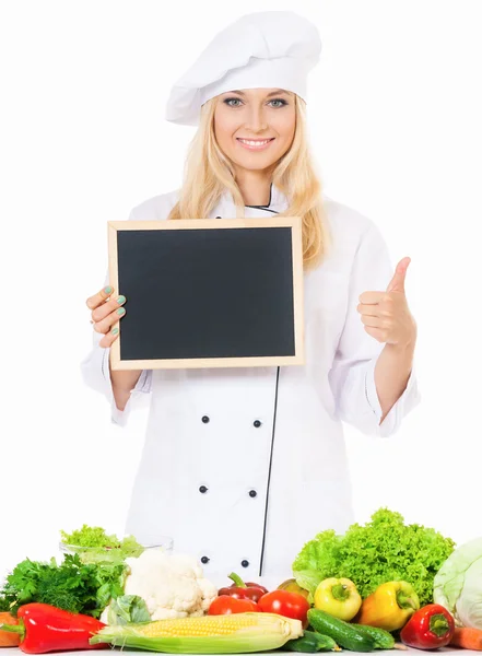 Femme cuisinier avec petit tableau noir — Photo