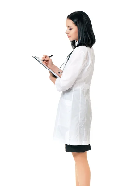 Female doctor holding clipboard — Stock Photo, Image