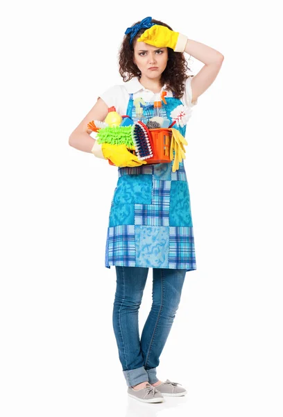 Tired young housewife with gloves — Stock Photo, Image