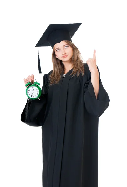 Woman graduating with clock — Stock Photo, Image