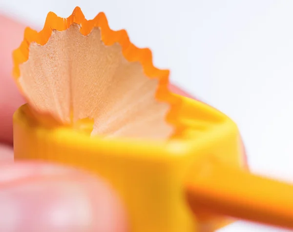 Man sharpening a pencil — Stock Photo, Image