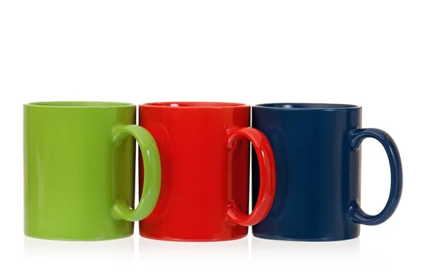 Drie kleur koffie kopjes — Stockfoto