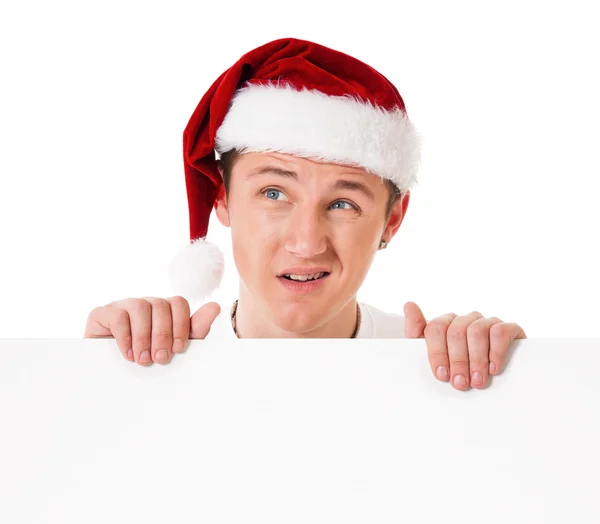 Menino usando chapéu de Papai Noel — Fotografia de Stock