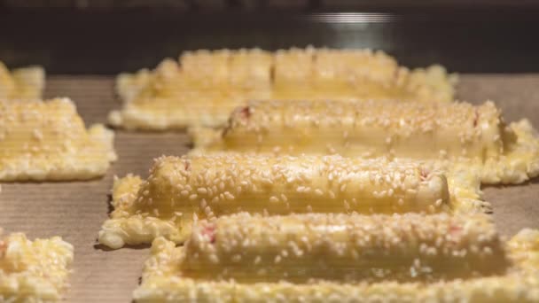 4K Time Lapse of baking of puff pastry in oven — Stock Video