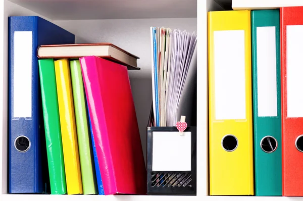 Folders on shelves Stock Picture