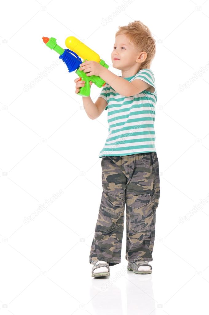 Boy with water gun