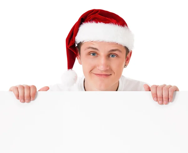 Junger Mann mit Weihnachtsmütze — Stockfoto