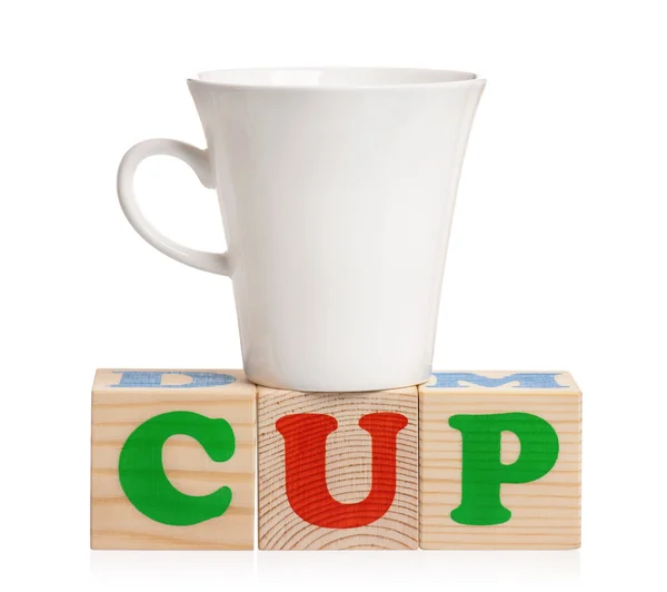 Cup with blocks — Stock Photo, Image