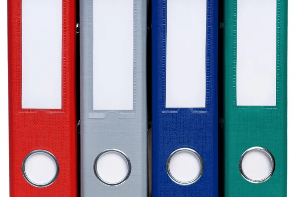 Colorful folders on shelves — Stock Photo, Image