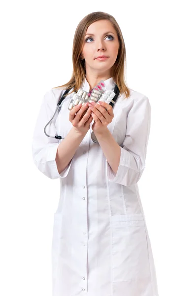 Female doctor holding the pills — Stock Photo, Image