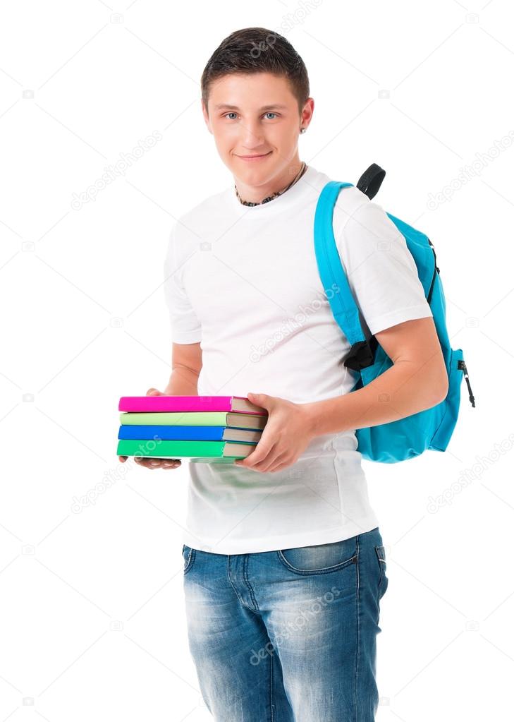 Student boy with backpack carrying books