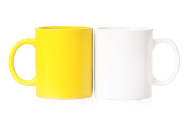 Tasses jaunes et blanches pour café ou thé — Photo