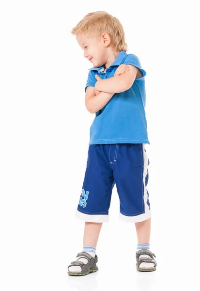 Mały chłopiec z rękami splecionymi — Zdjęcie stockowe