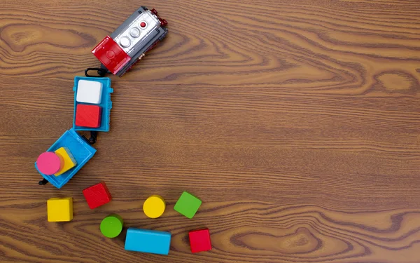 Toy train hauling color blocks — Stock Photo, Image