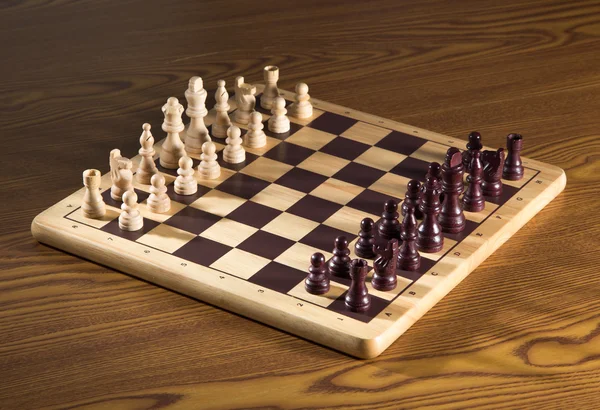 Chess board with chess wooden pieces — Stock Photo, Image