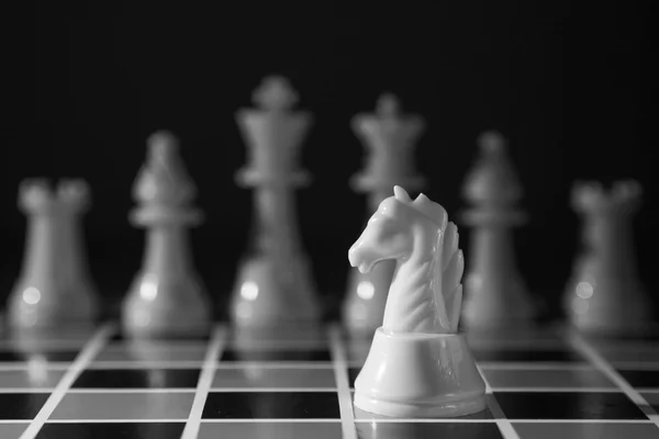 Chess piece on the board background — Stock Photo, Image